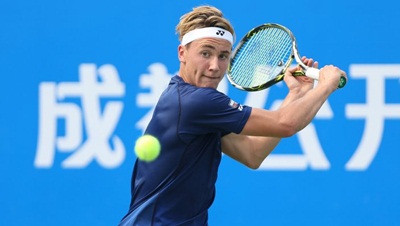 CHENGDU, CHINA - SEPTEMBER 28: Casper Ruud of Norway returns a shot during the match against Viktor Troicki of Serbia during Day 3 of 2016 ATP Chengdu Open at Sichuan International Tennis Centre on September 28, 2016 in Chengdu, China. (Photo by Zhong Zhi/Getty Images)